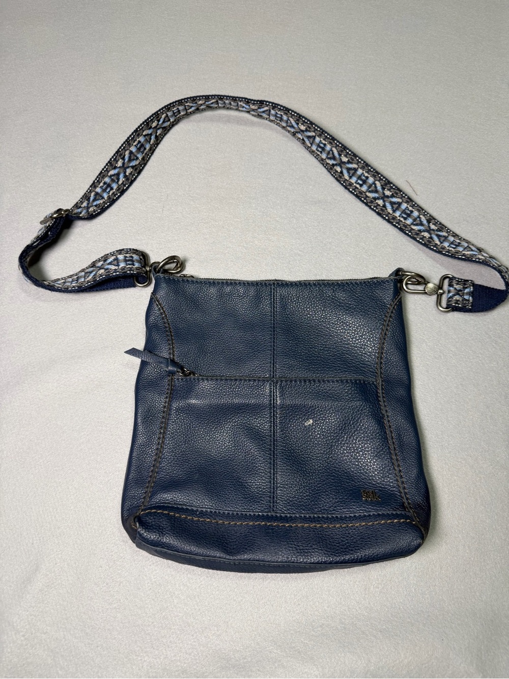 The Sak Navy Leather Crossbody with Patterned Strap